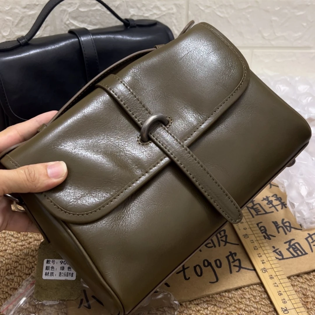 绿。头层牛皮真皮包包