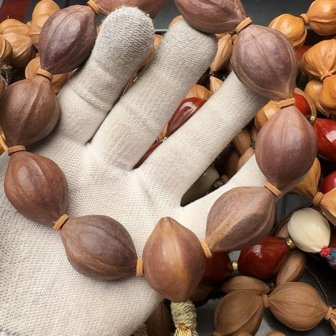 橄榄核把件紫皮核