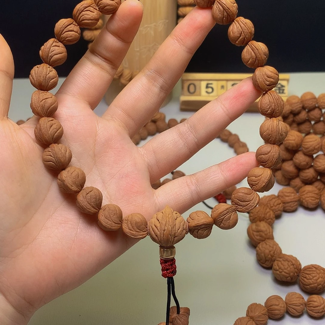 桃核吊坠李**棒玉龙脊手持+雕刻籽