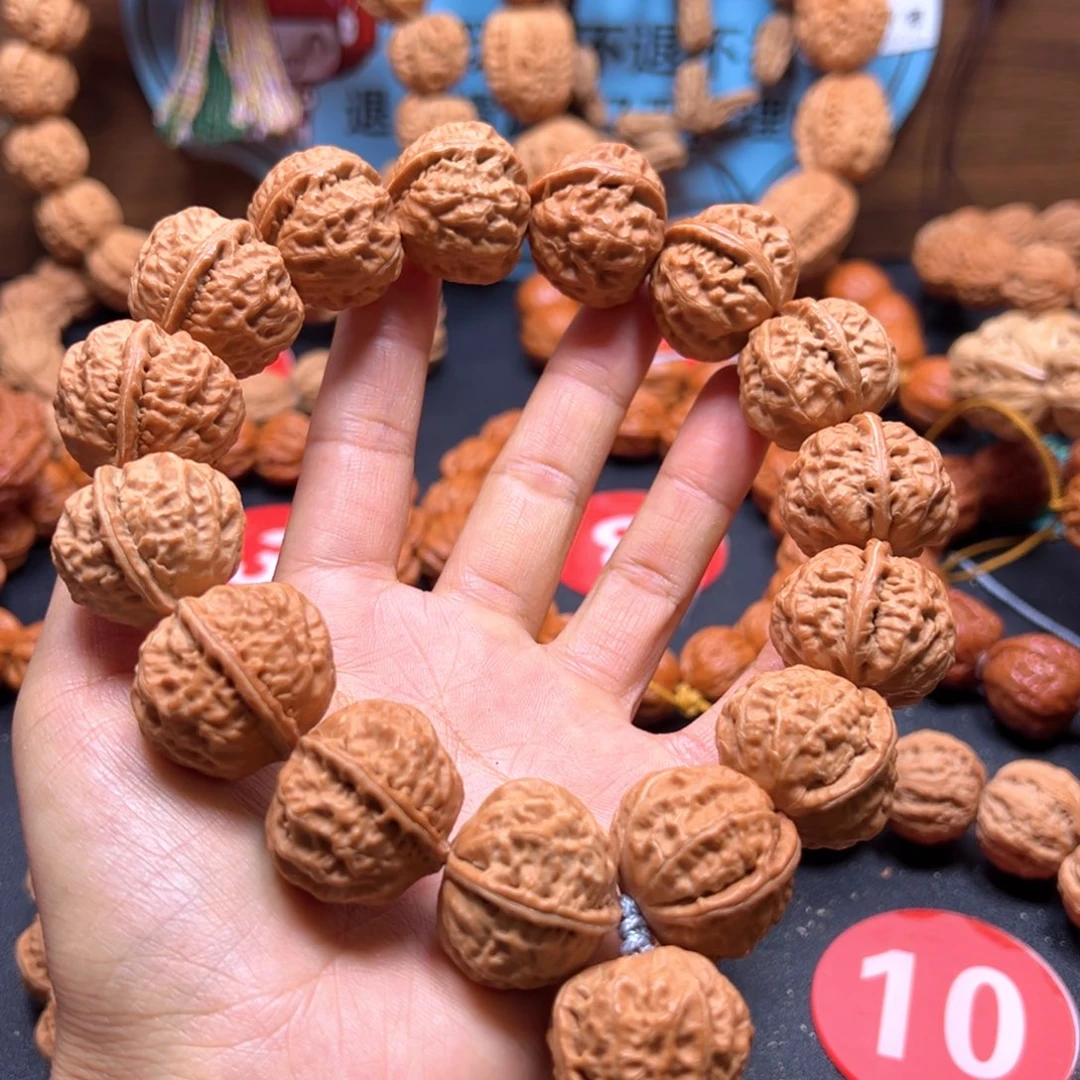 坚***持文玩核桃吊坠小核桃24加