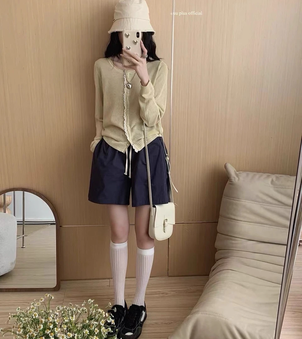门襟碎白双扣长袖针织开衫  咻咻X2C4639