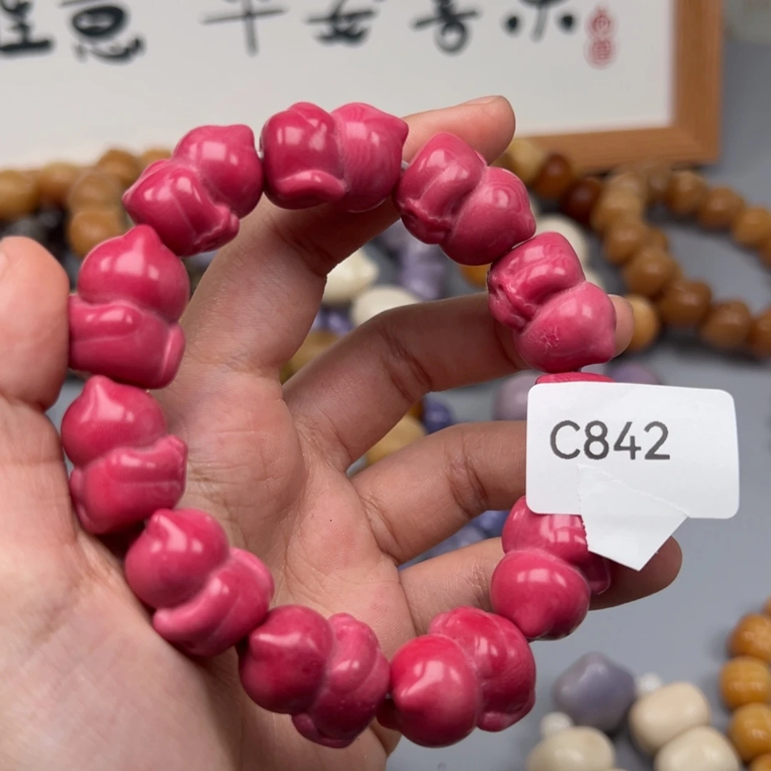 苬***沐菩提根/象牙果吊坠C842猫毛20-23瑕疵一串