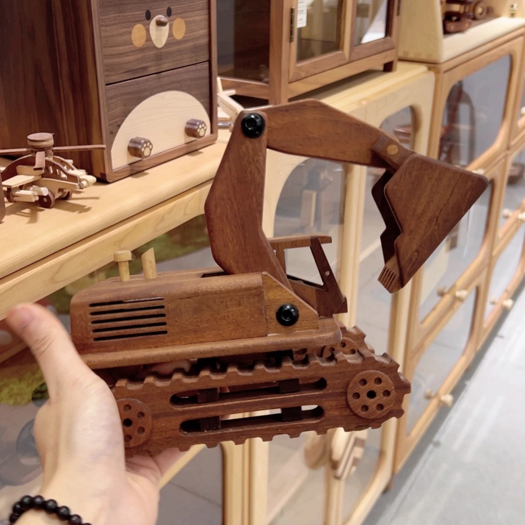 琪***原木挖掘机沙比利木材