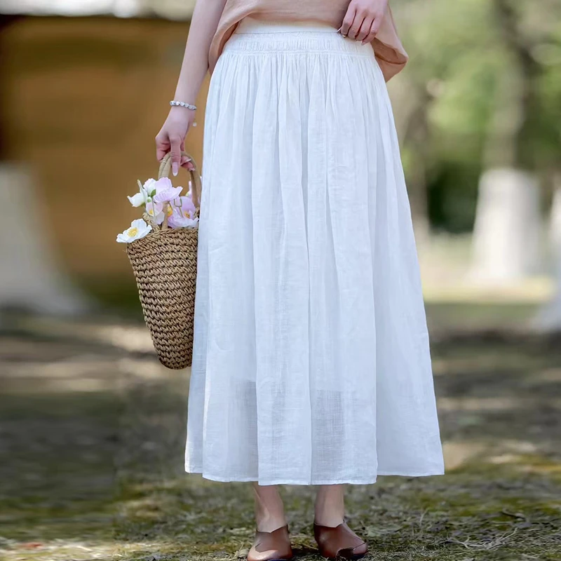 2025夏季新款高端苎麻褶皱飘逸半身裙女纯色宽松休闲松紧腰中长裙
