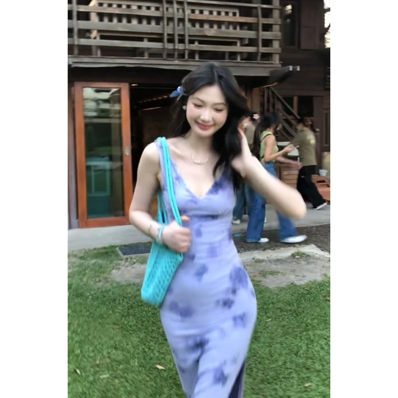 紫色v领吊带碎花连衣裙子女夏季2025新款海边度假风掐腰包臀长裙