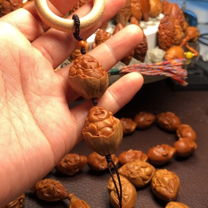 只***行橄榄核吊坠橄榄核雕刻的单子