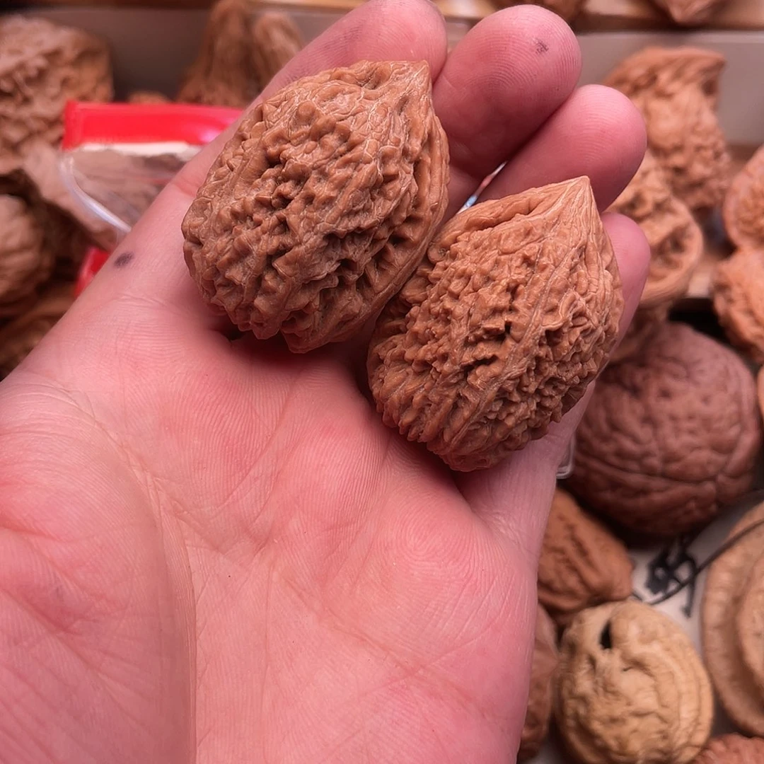 刘***屈文玩核桃吊坠大蒜