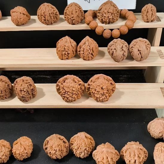 橙***子文玩核桃吊坠35角白