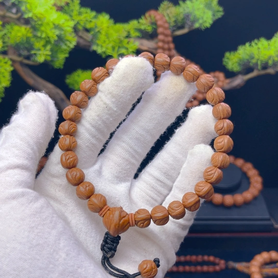 胜***）桃核吊坠野生桃核