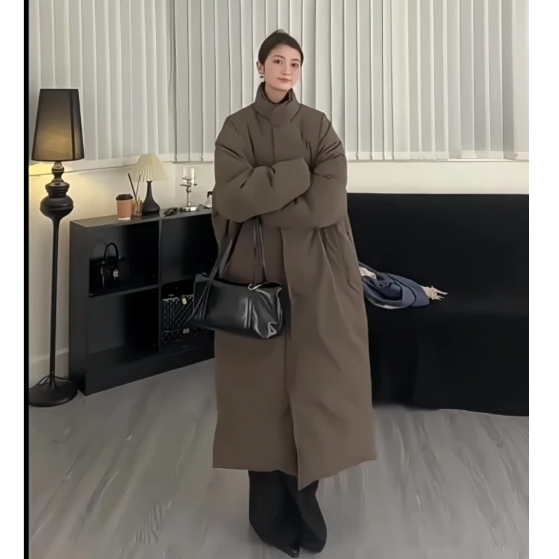 白色长款过膝羽绒服女款冬季流行风格2025新款独特超好看保暖外套