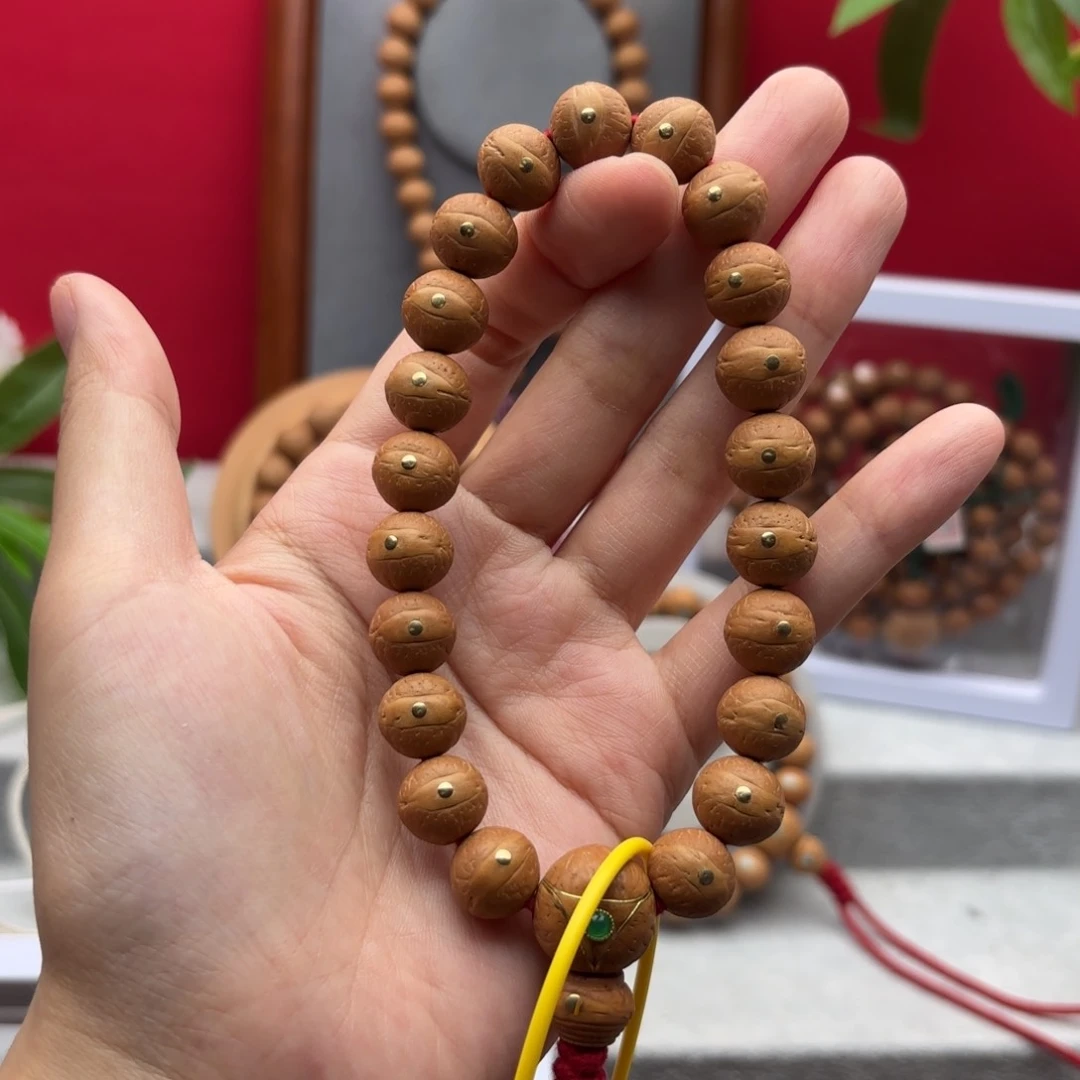 凤眼菩提手串12左右铜钉镶嵌手串
