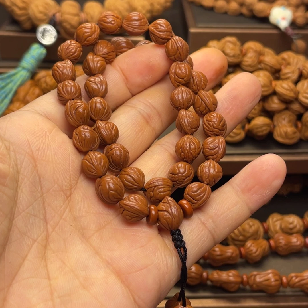 梦***营手串桃核龙纹桃核33