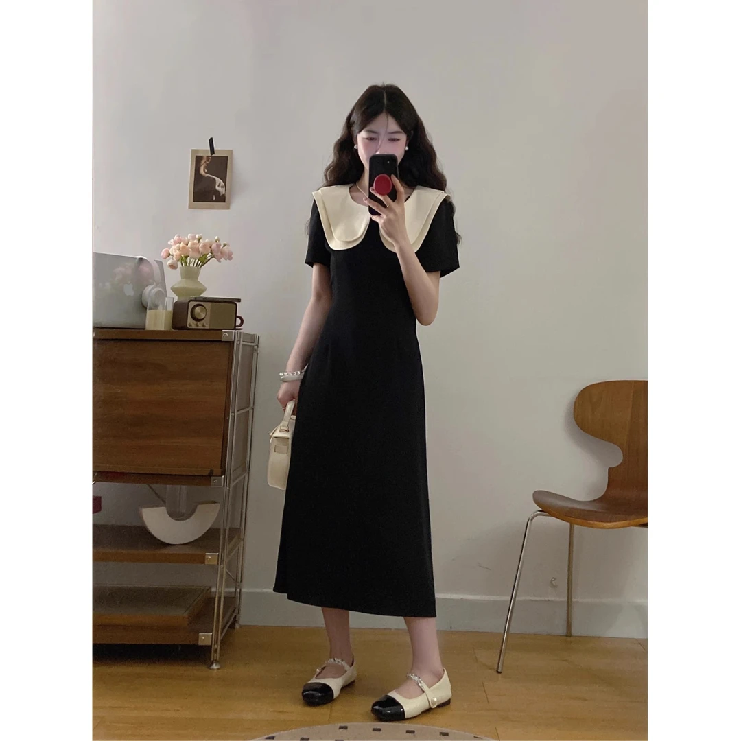 法式气质收腰娃娃领连衣裙女2025夏季新款撞色拼接别致小黑裙长裙