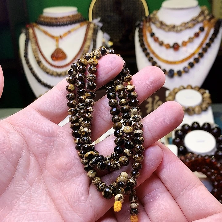 琥珀未镶嵌裸石6+熊猫纯的