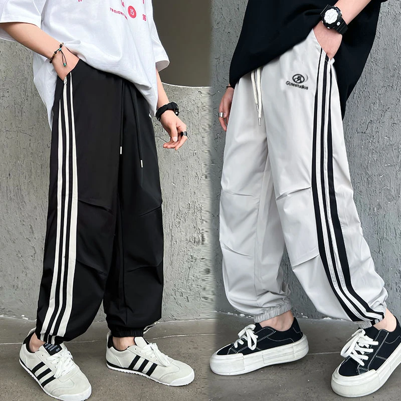 【现货现发】2025休闲风男女拉条裤子休闲宽松最新款运动长裤