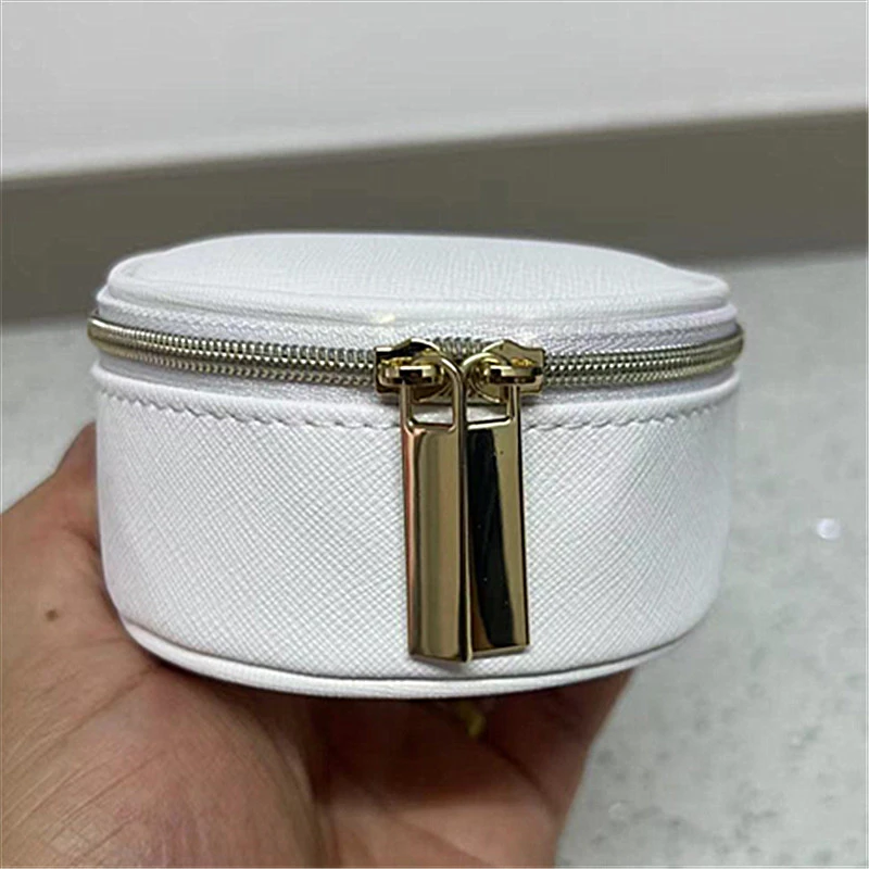 白色圆形化妆包气垫抽绳包小巧首饰收纳包便携零钱包小巧精致