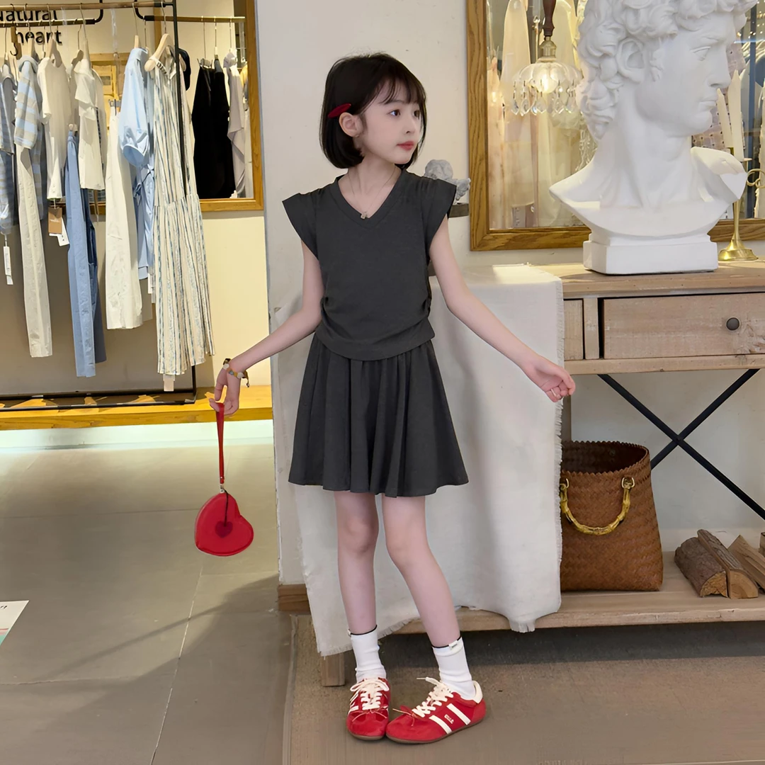 2025女童韩系慵懒休闲纯色短袖修身抽褶T恤加百褶裙裤套装设计感6