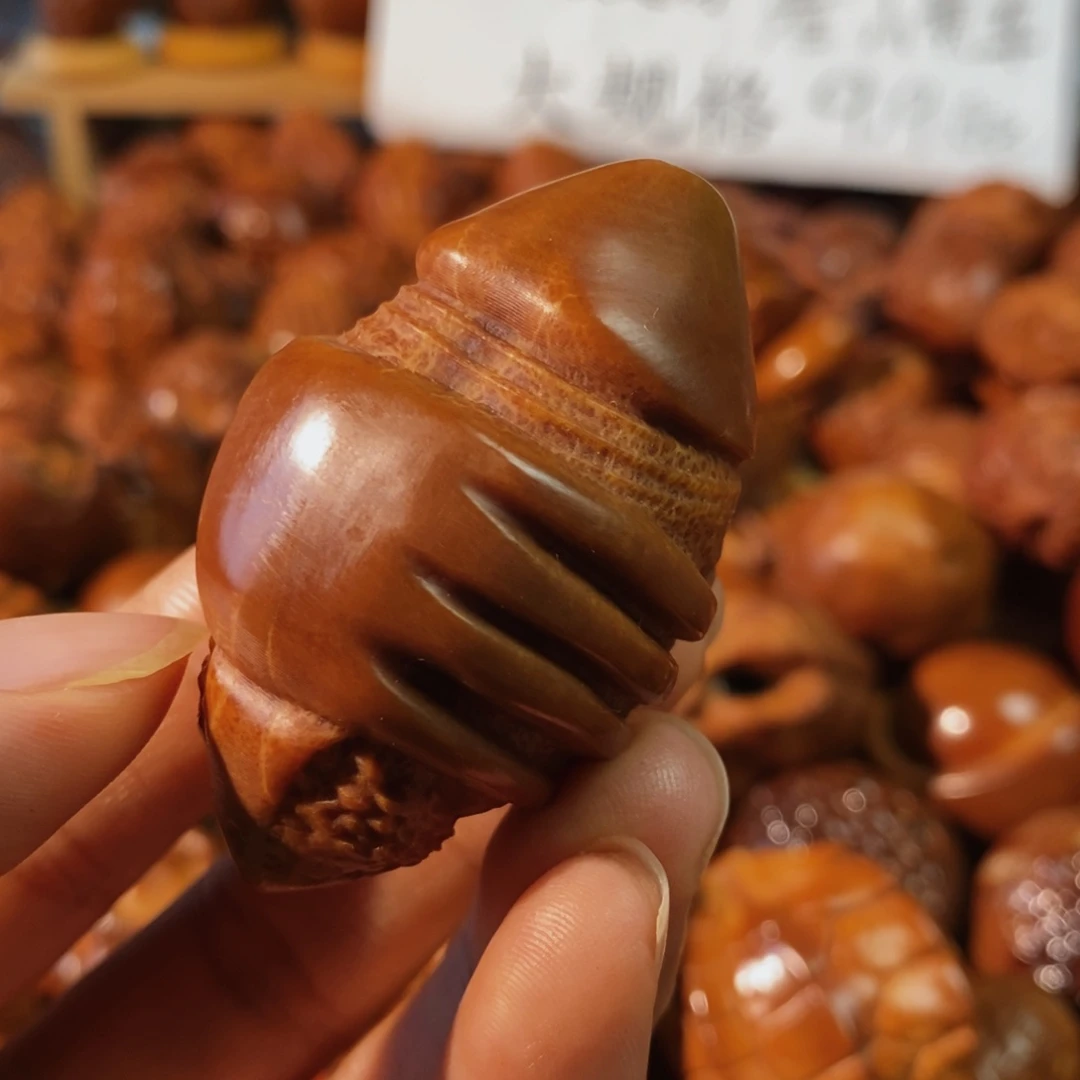 橄榄核把件大权在握