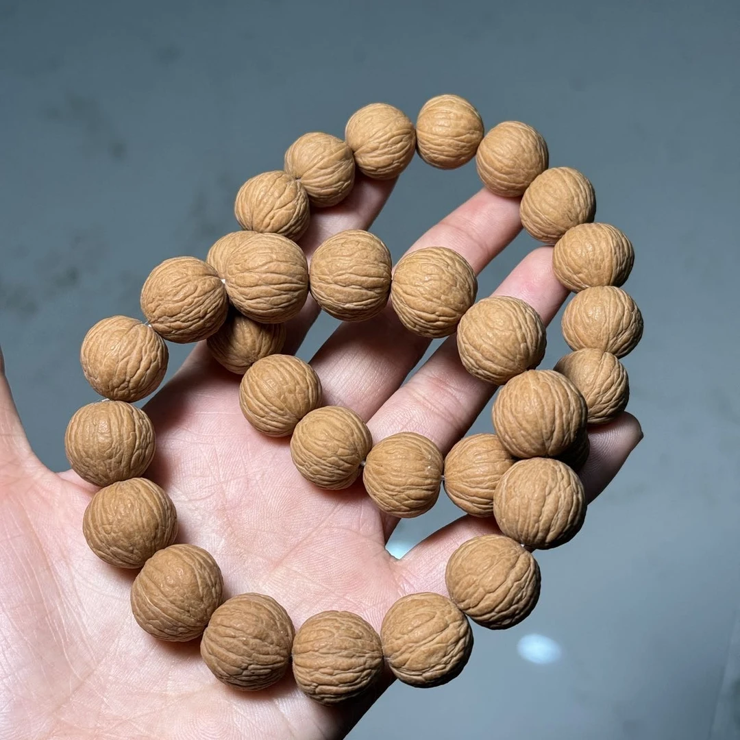 【曹掌柜精选】16  G18447-猴头凤羽手串-14-15mm-多样性发其一