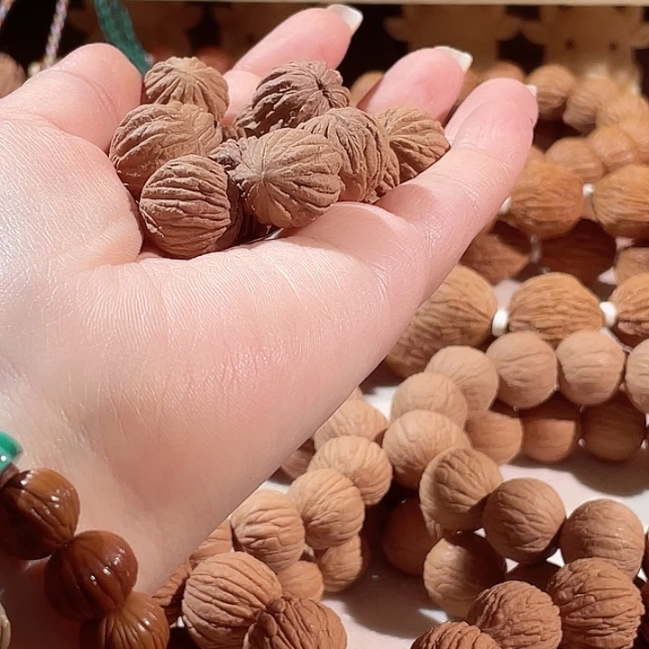 L***T猴头核桃手串深纹金丝