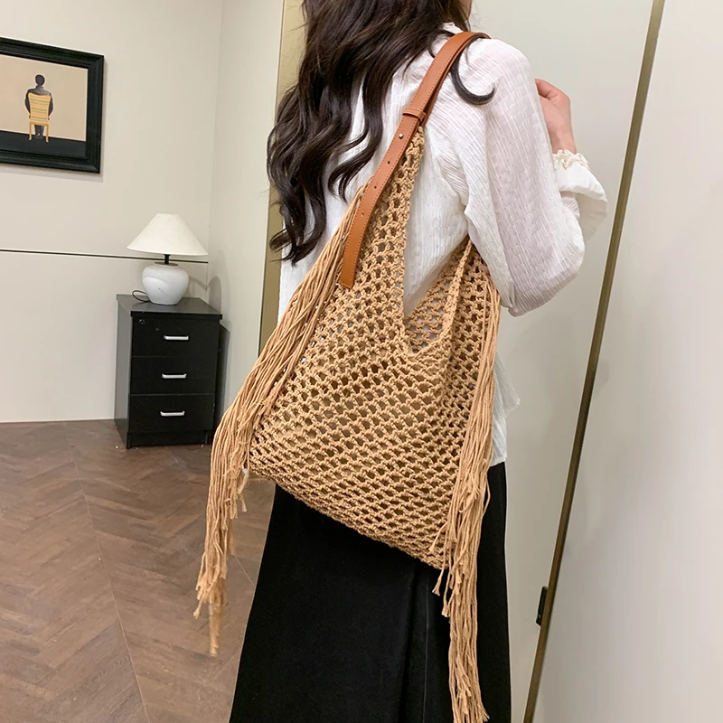 春夏大容量流苏编织包包女2025新款镂空海边度假沙滩包腋下单肩包