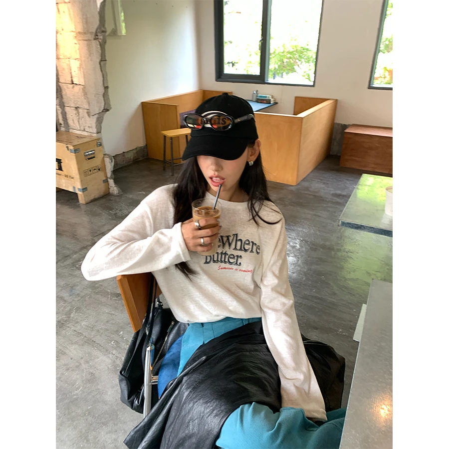 广州黄峥2025秋季韩系字母圆领简约休闲韩系长袖T恤女上衣530904
