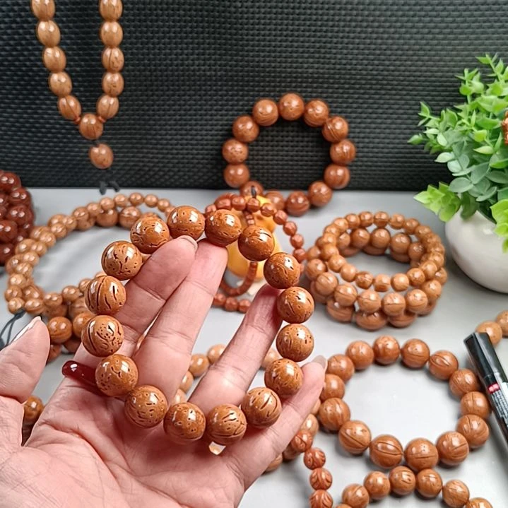 桃核手串铁籽密纹黄皮15