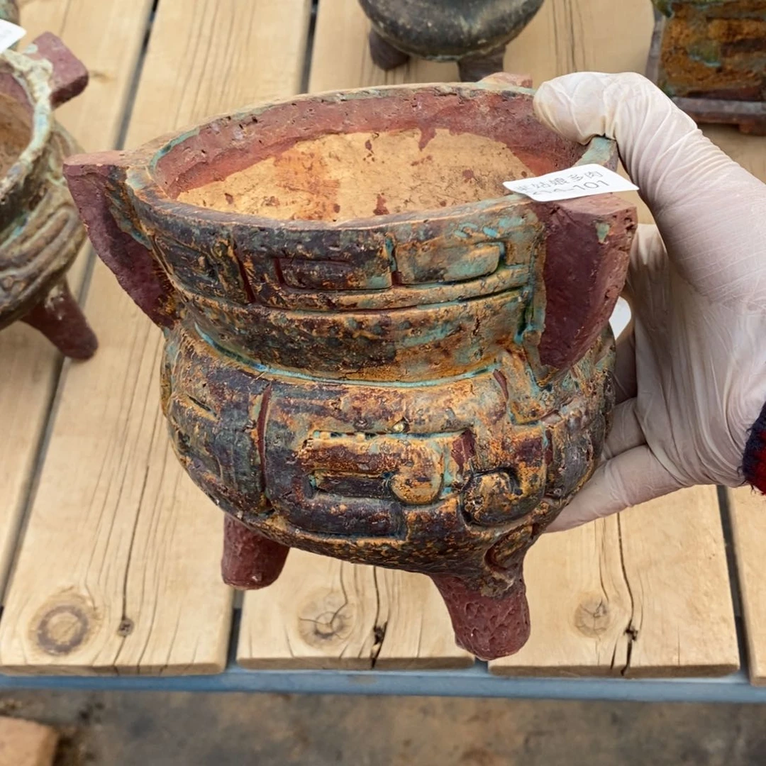 红陶久****?101号多肉盆一个呀