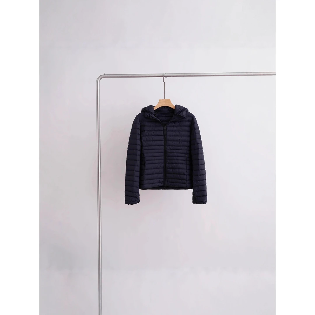 DUCURNO黑色连帽排骨羽绒服女冬季2025新款休闲气质轻薄保暖外套