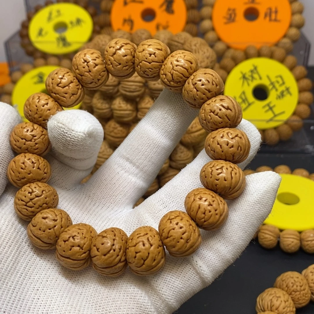 顺***水手串桃核树王纽扣桃核手串大板牙脐