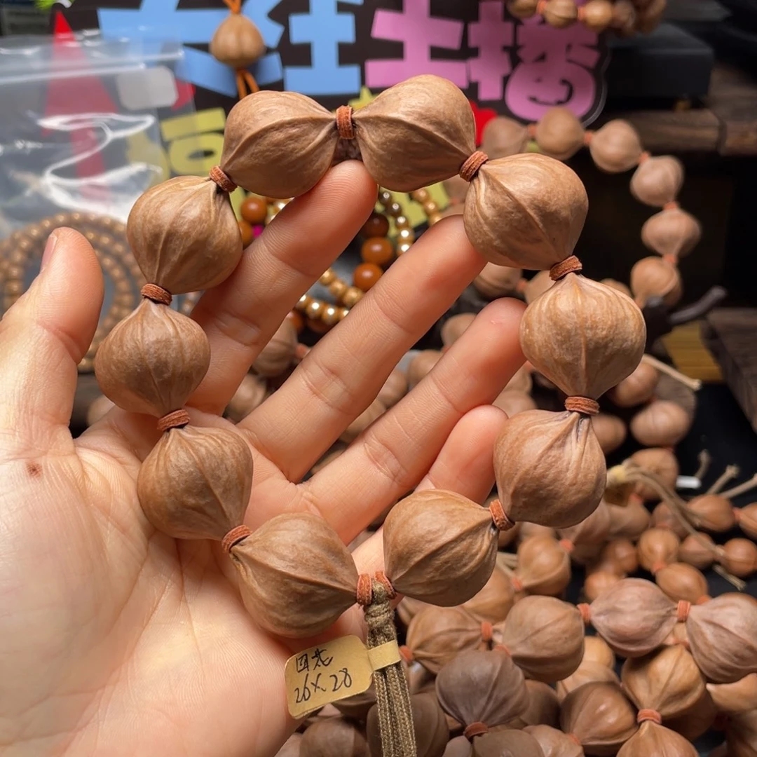 風***痕橄榄核吊坠四花铁核2628