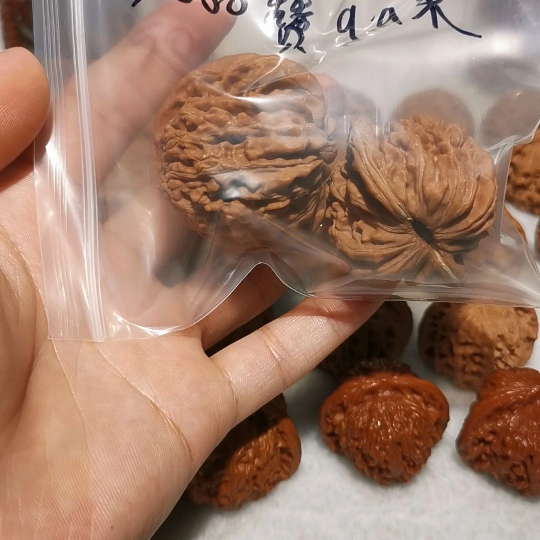 吊坠桃核智*人四座楼文玩核桃