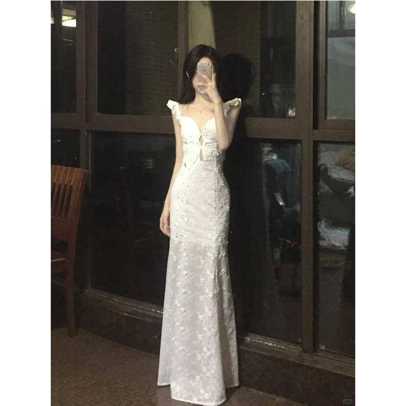 夏季新款法式蕾丝花朵镂空吊带连衣裙性感辣妹收腰显瘦包臀长裙子