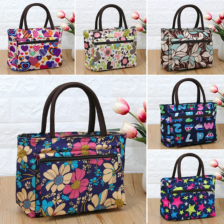 宏欣网红大容量手提化妆包牛津布防水女包妈媽咪包一件代发