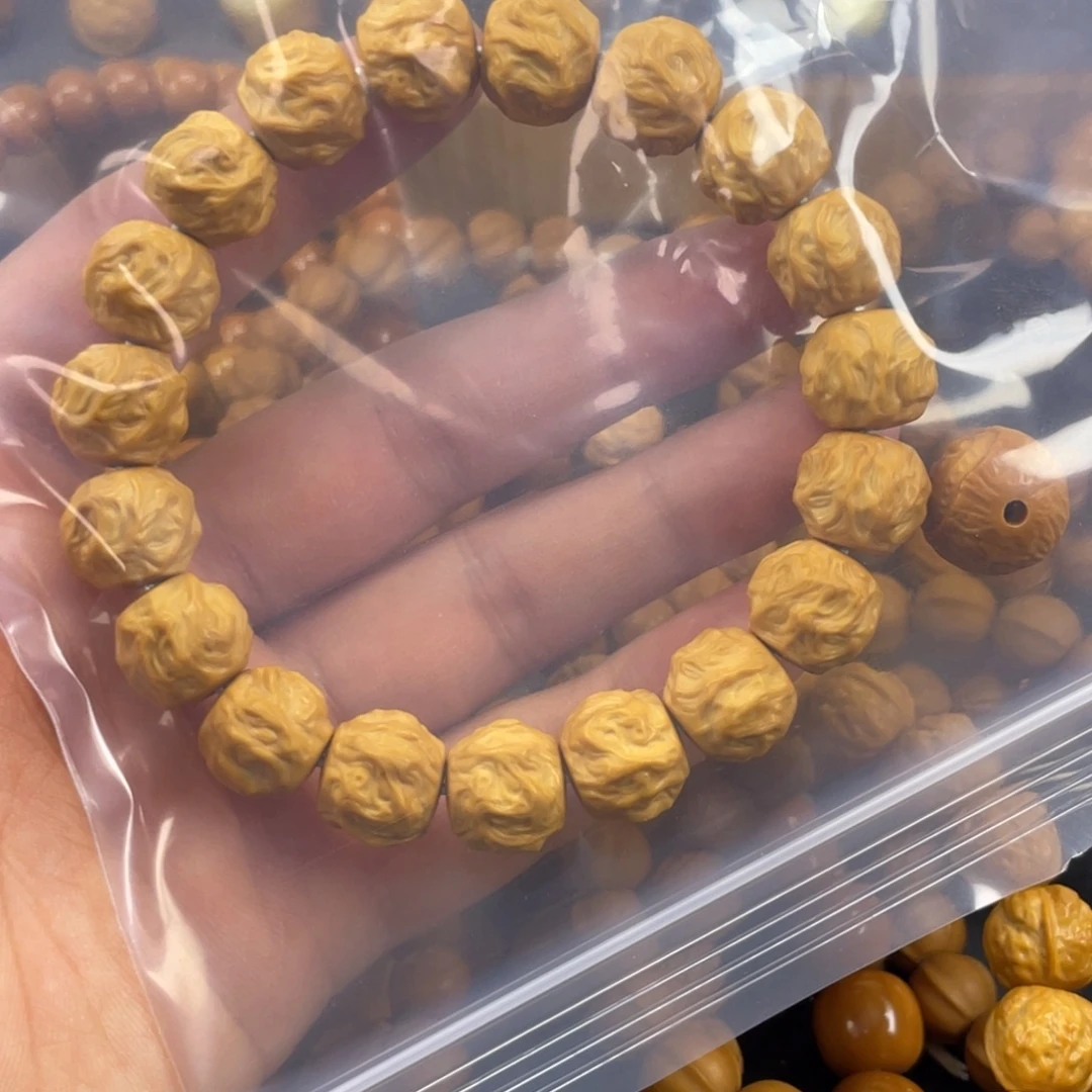 辻***望猴头核桃吊坠龙蛇
