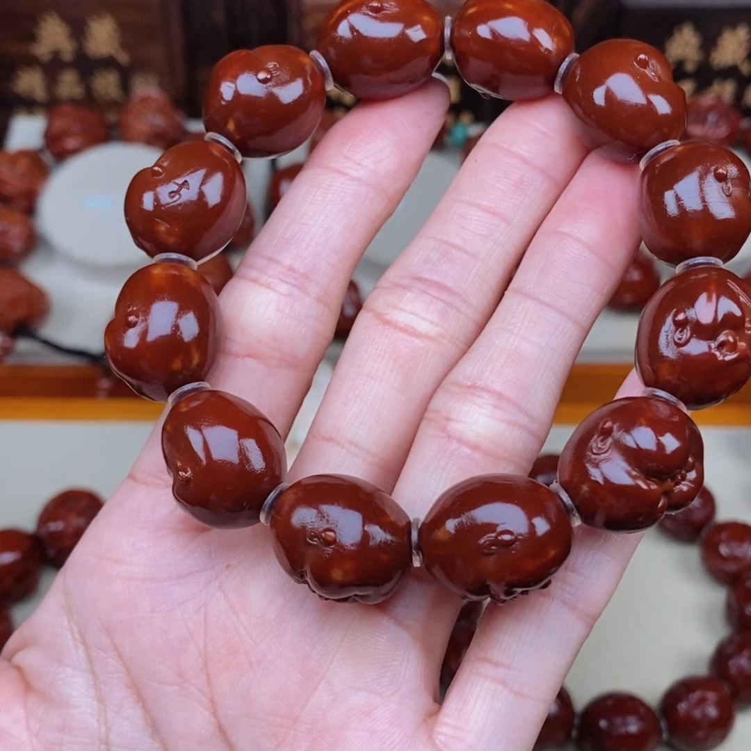 烈***喉橄榄核吊坠人生百态