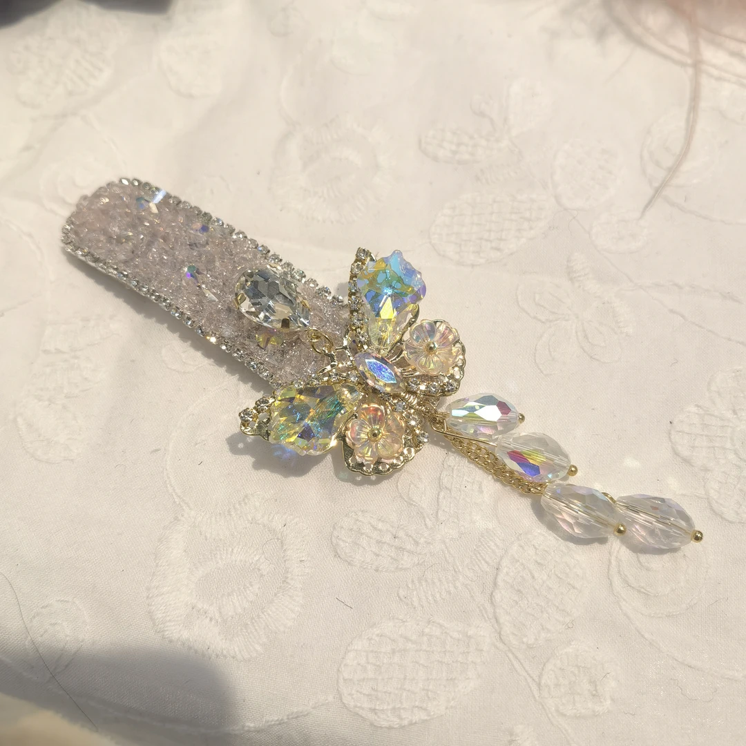 E988炫彩蝴蝶花花流苏款掰掰夹