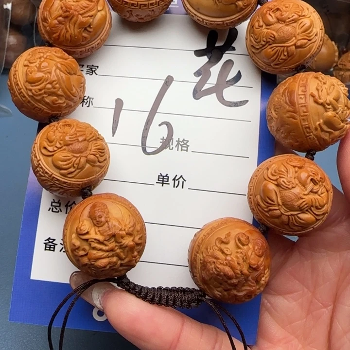 蛄***着橄榄核吊坠橄榄核