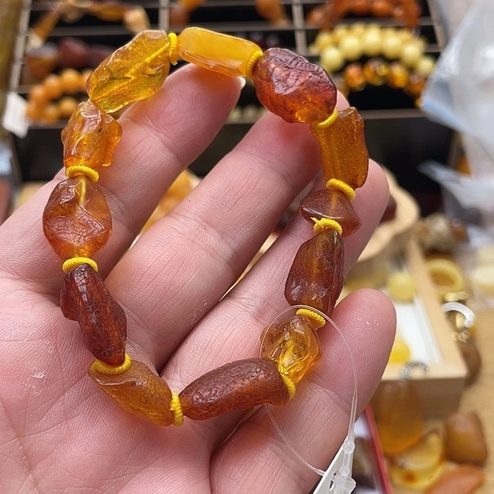 梆***拳琥珀未镶嵌套链手串