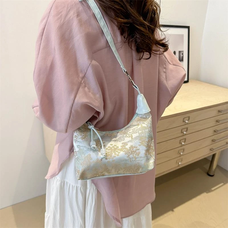 国风丝绸刺绣旗袍包包女2025新款夏季斜挎饺子包古风新中式手提包