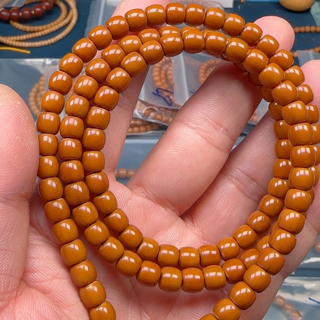 王***宇橄榄核手串老挝SSS级核尖极限弧尺寸6.8