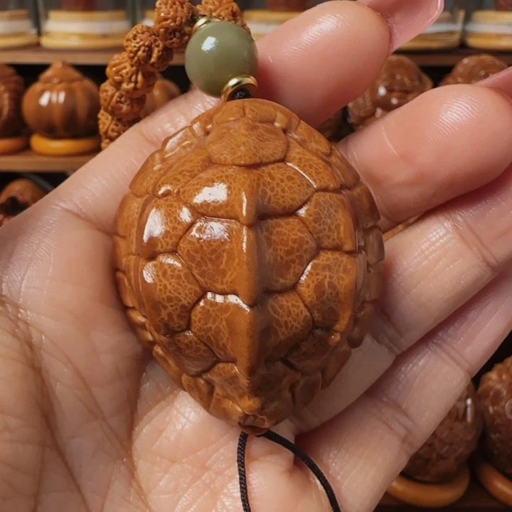 橄榄核把件用****5富甲一方手把件42