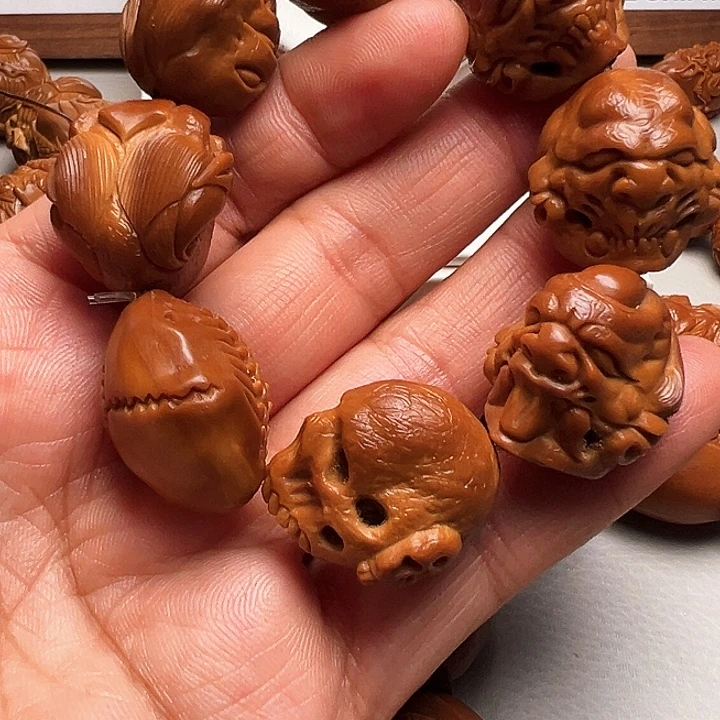 飞***车橄榄核手串/手链骷髅串