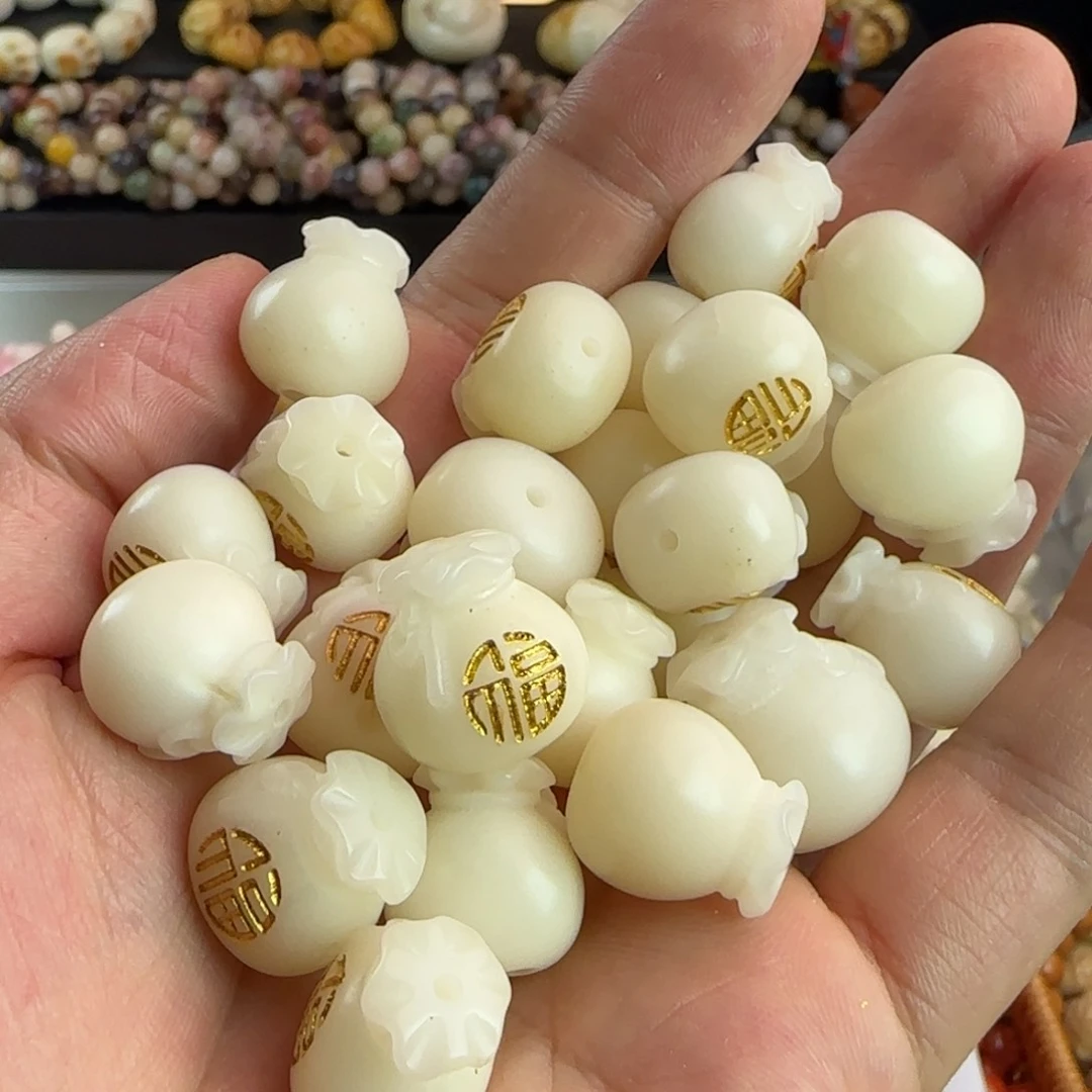 菩提根/象牙果吊坠瑕疵卡17描金福袋50颗（批发不挑瑕）