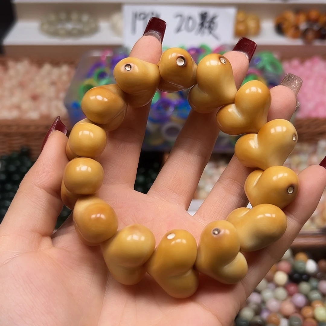 手串菩提根/象牙果瑕疵炭烤爱心14颗1条有眼