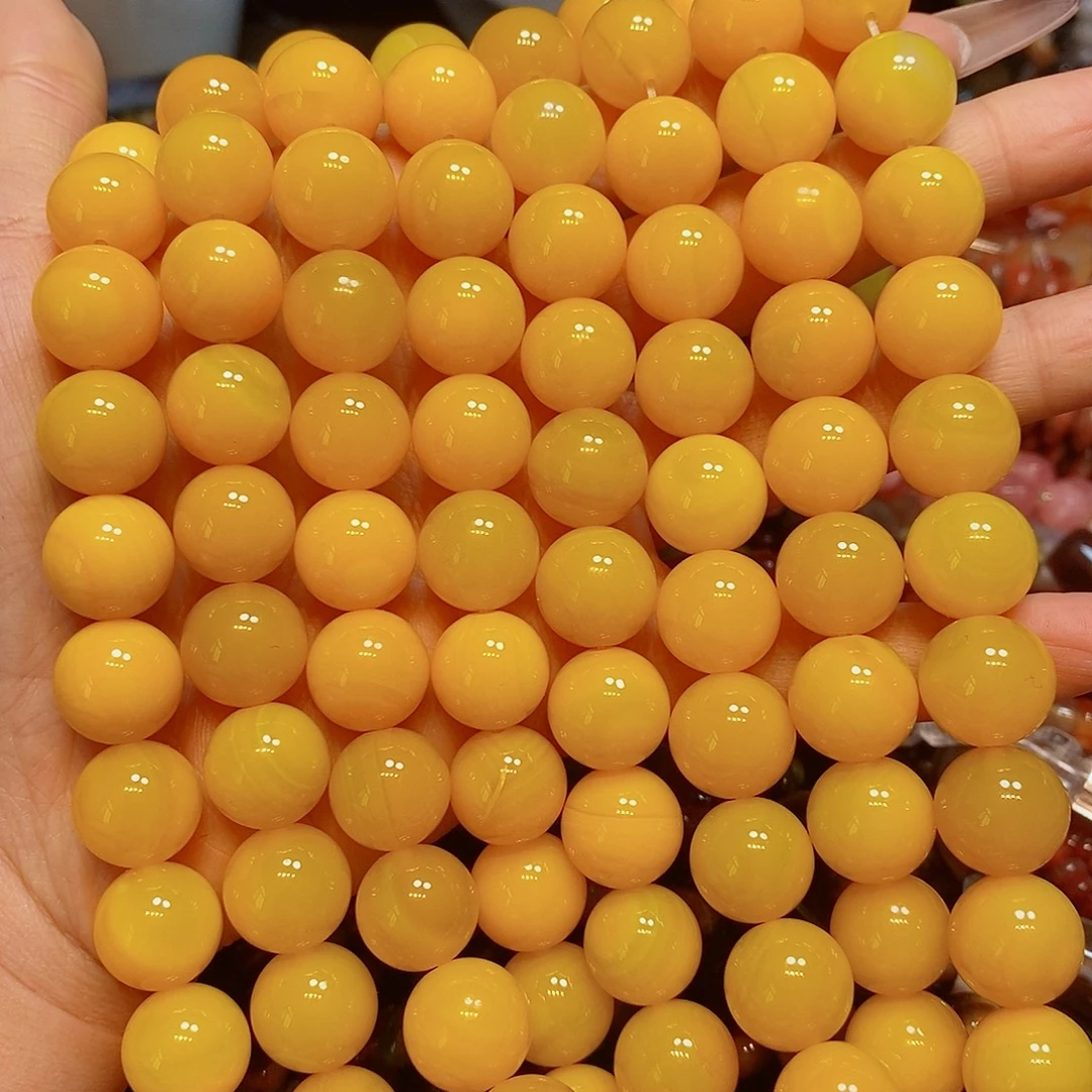玛瑙/玉髓散珠鸡油黄实色玛瑙14mm一条