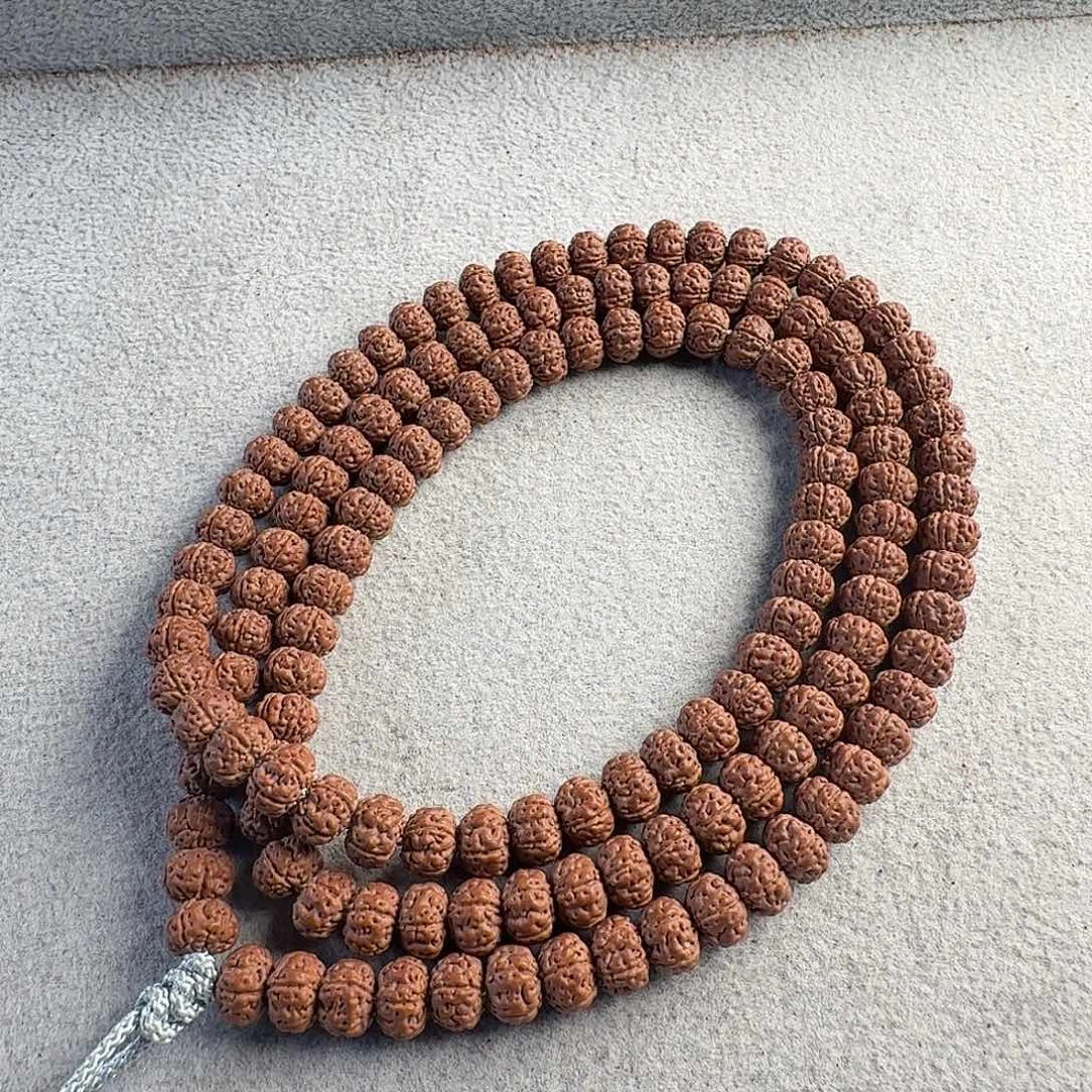 金刚菩提吊坠7.6头货老树王孔边丝黄