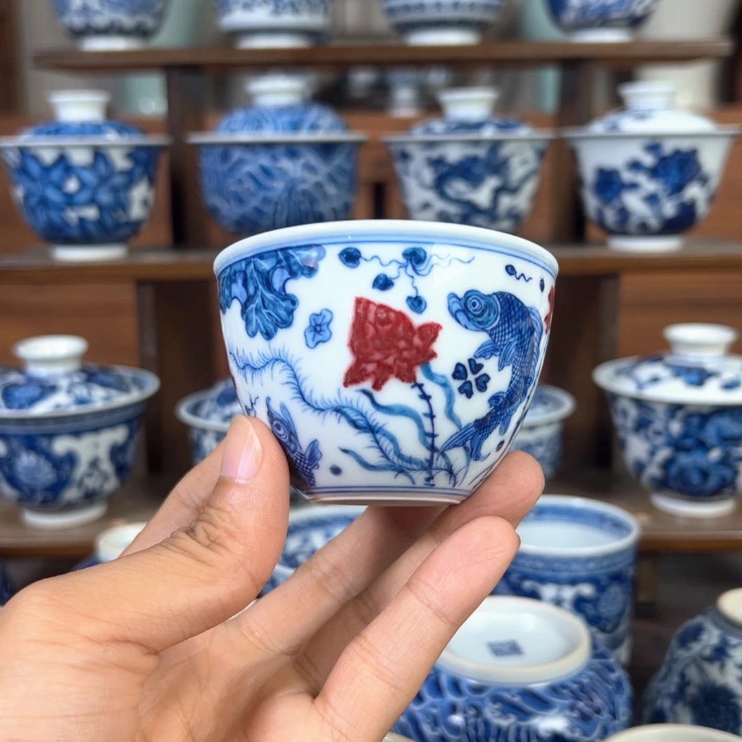 力**?釉里红缸杯鱼藻纹