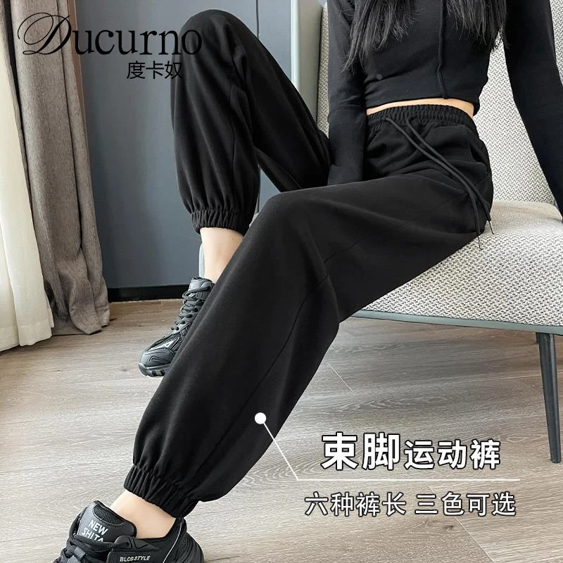 黑色运动裤女秋冬加长休闲显瘦宽松束脚卫裤2025新款冬季加绒裤子
