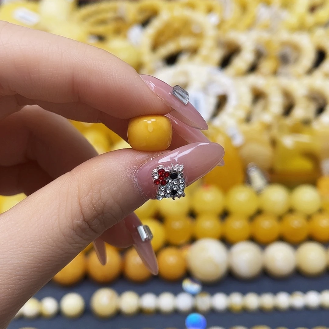 昆***光裸石蜜蜡未镶嵌10x8mm瑕疵花粉
